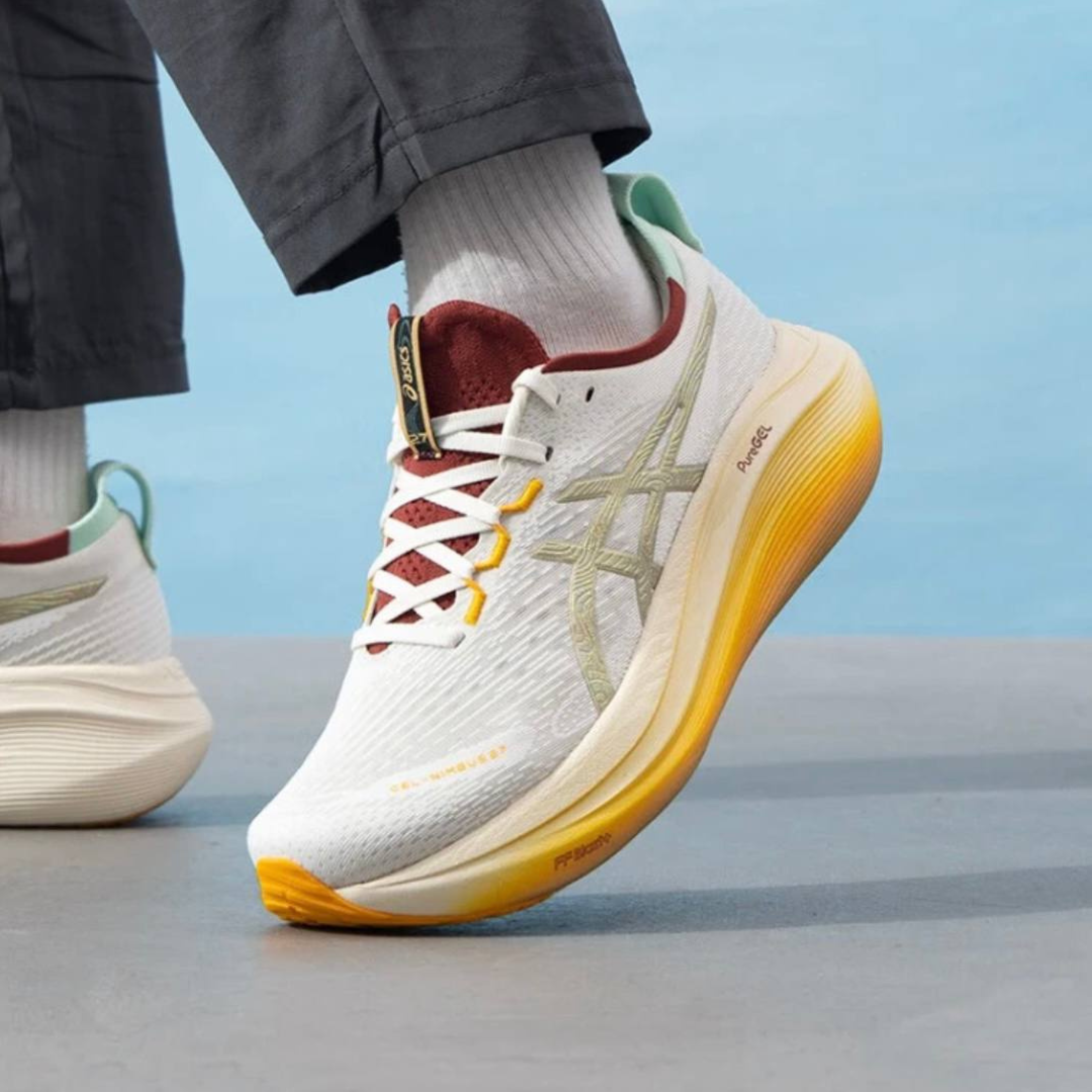 Asics Gel - Nimbus 27 - Branco/Dourado